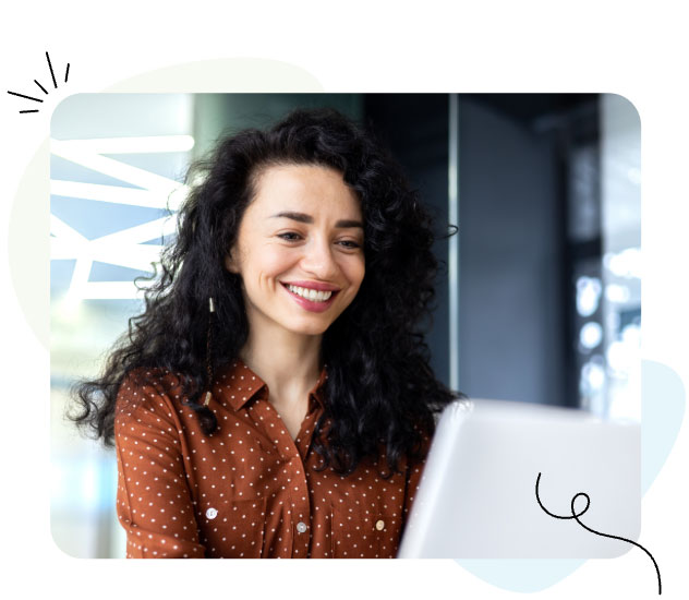 Lady smiling on laptop